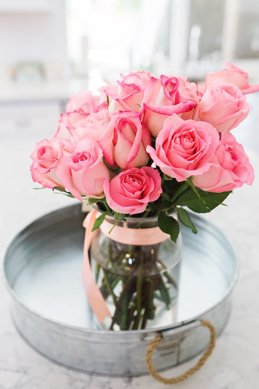 Easter Decorating Ideas bright flowers pink roses galvanized tray